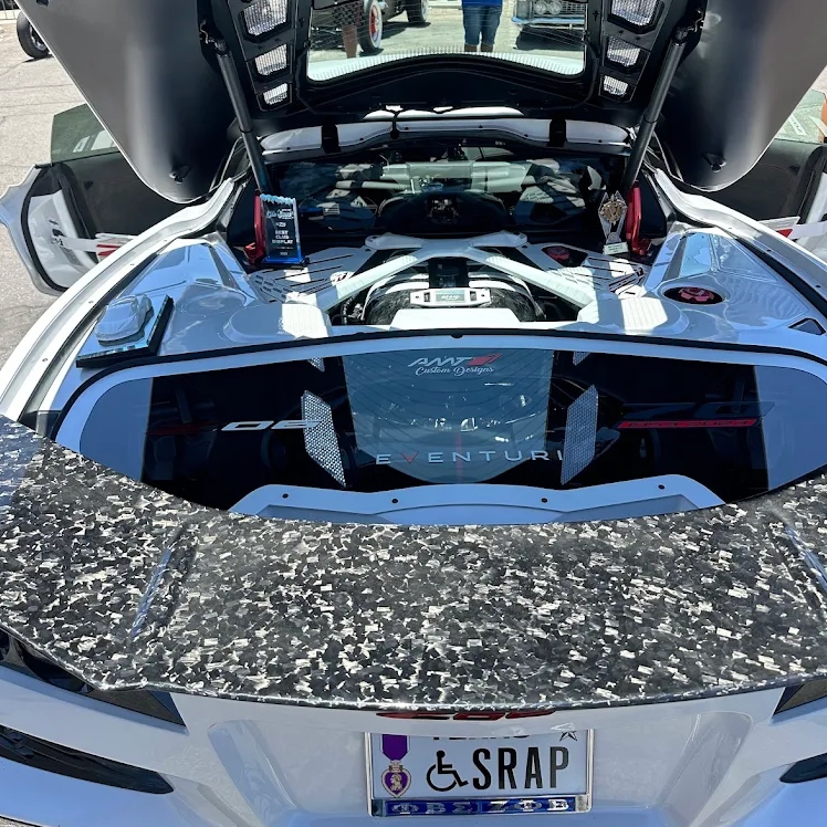 Corvette C8 engine bay detailing with carbon fiber